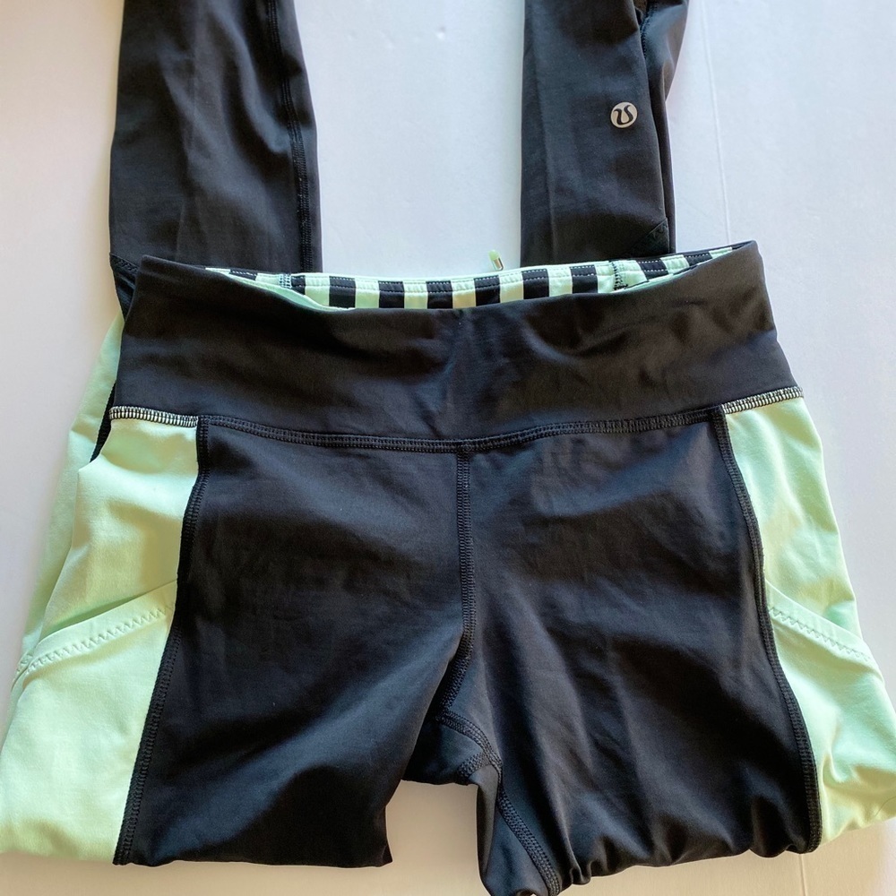 Lululemon leggings Get up and Glow women’s 6 six black green side pockets VGUC